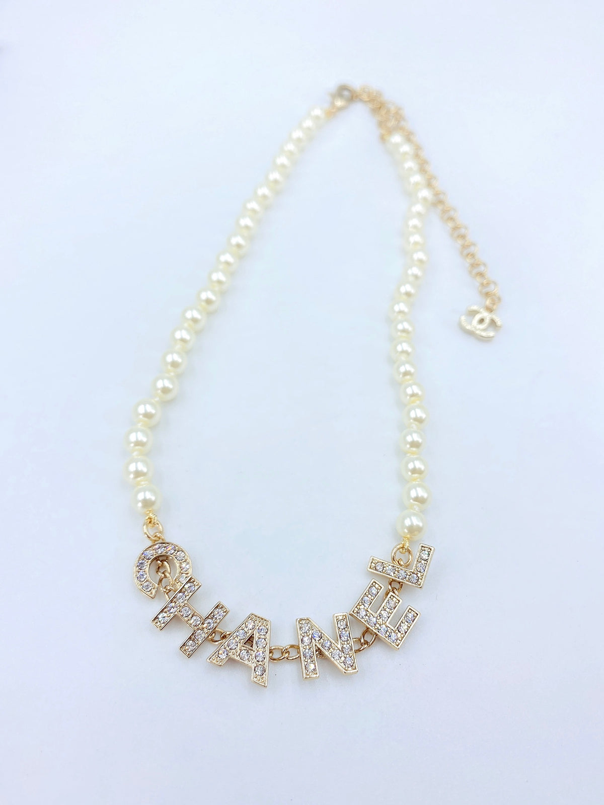 Chanel Pearl Letter Necklace - album image 1