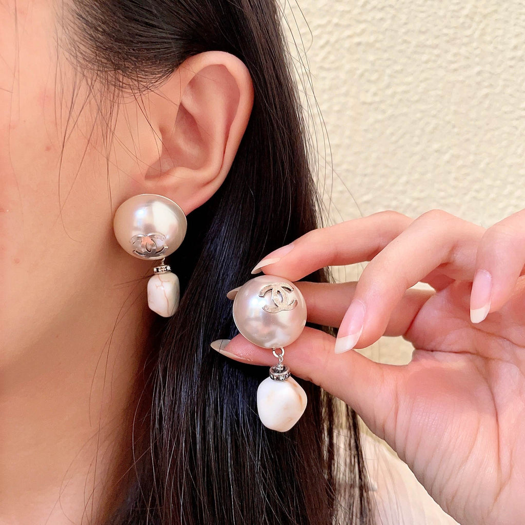 Chanel Interlocking C Pearl Earrings - album image 1