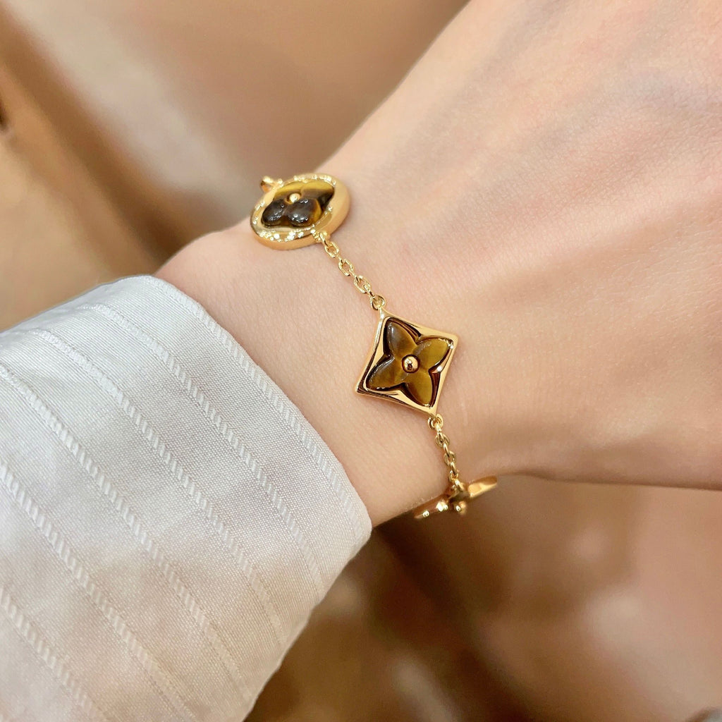 Louis Vuitton Gold-Tone Flower Charm Bracelet - album image 1