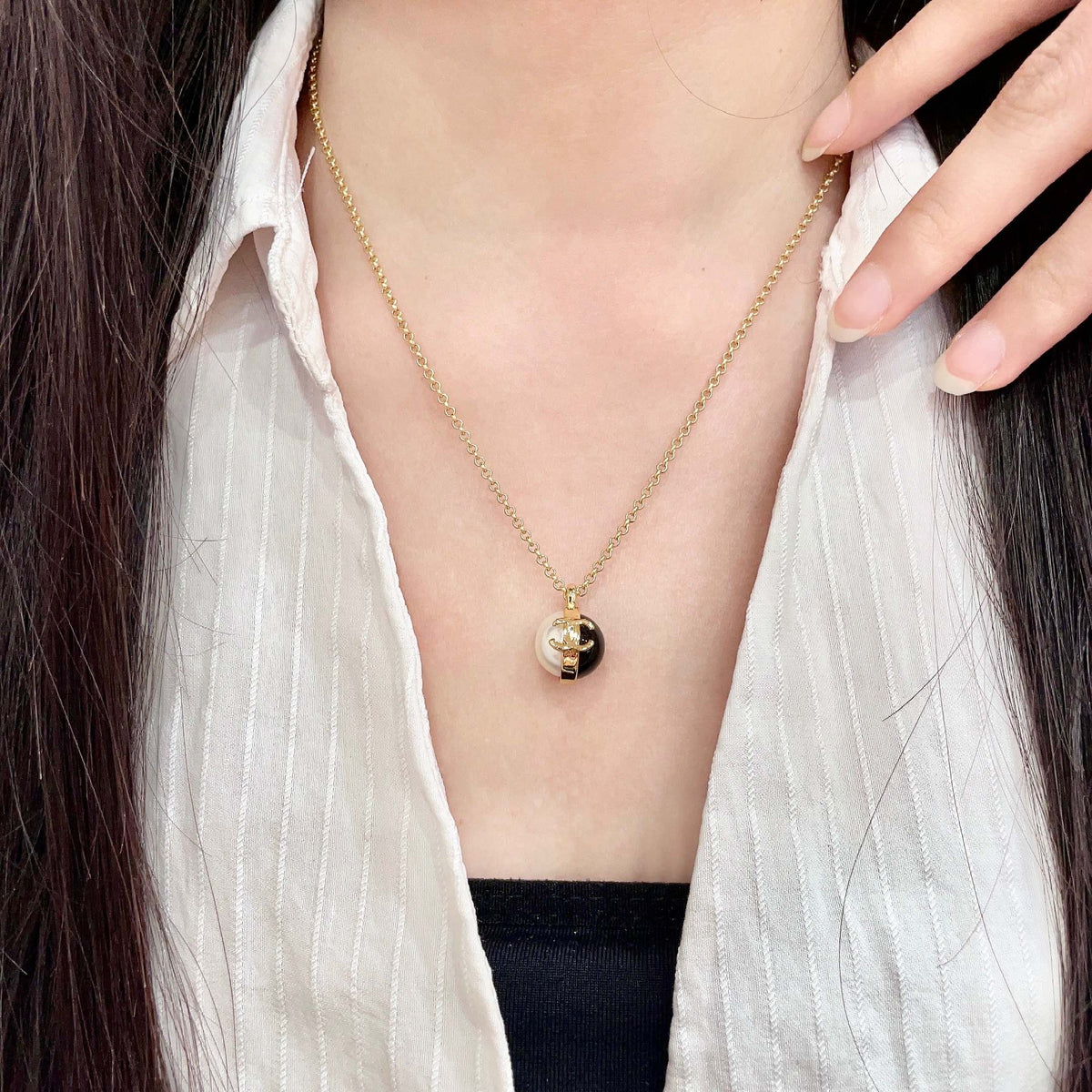 Chanel Gold-Tone Round Pendant Necklace - album image 1