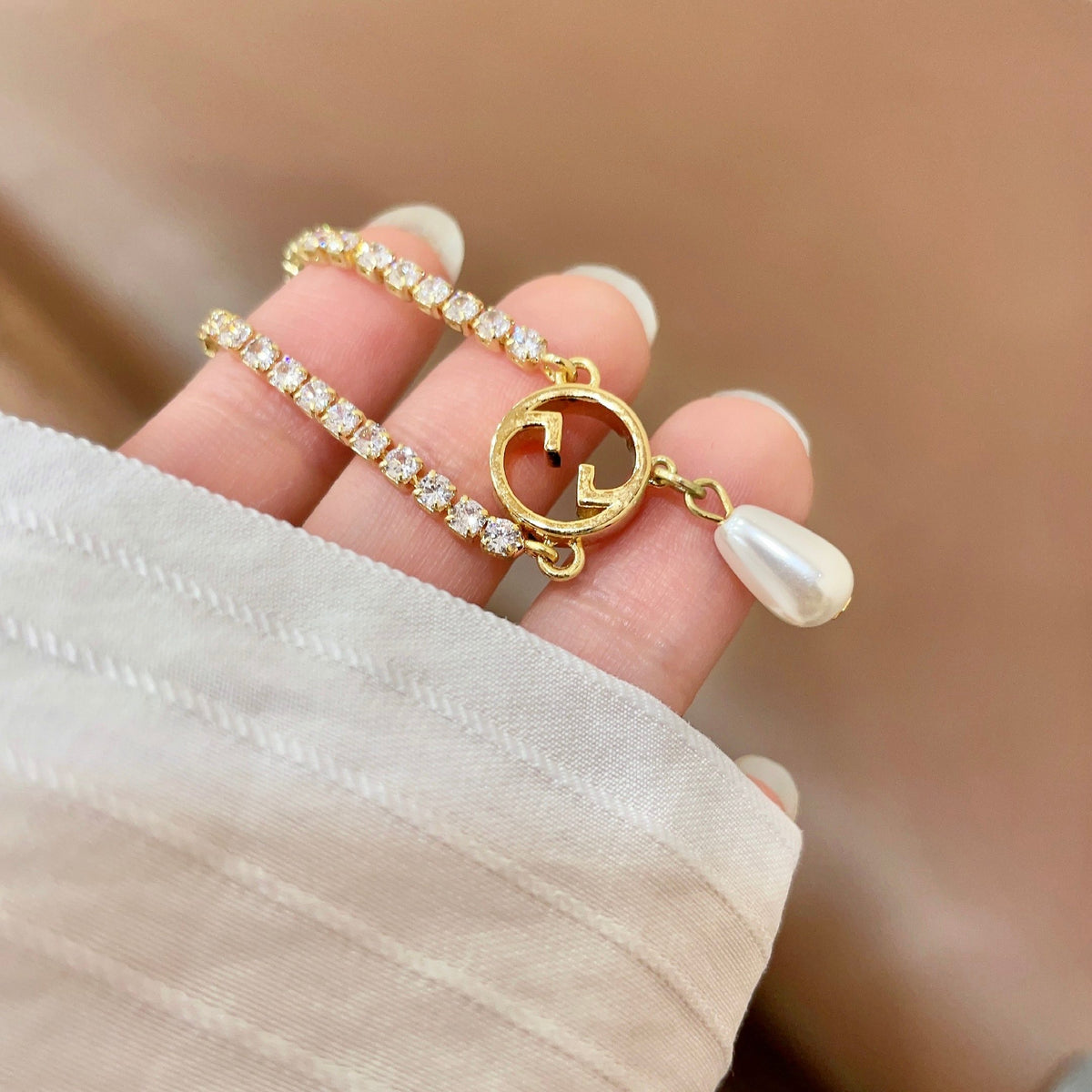 Gucci Gold-Tone G Charm Bracelet with Teardrop Accent - album image 3