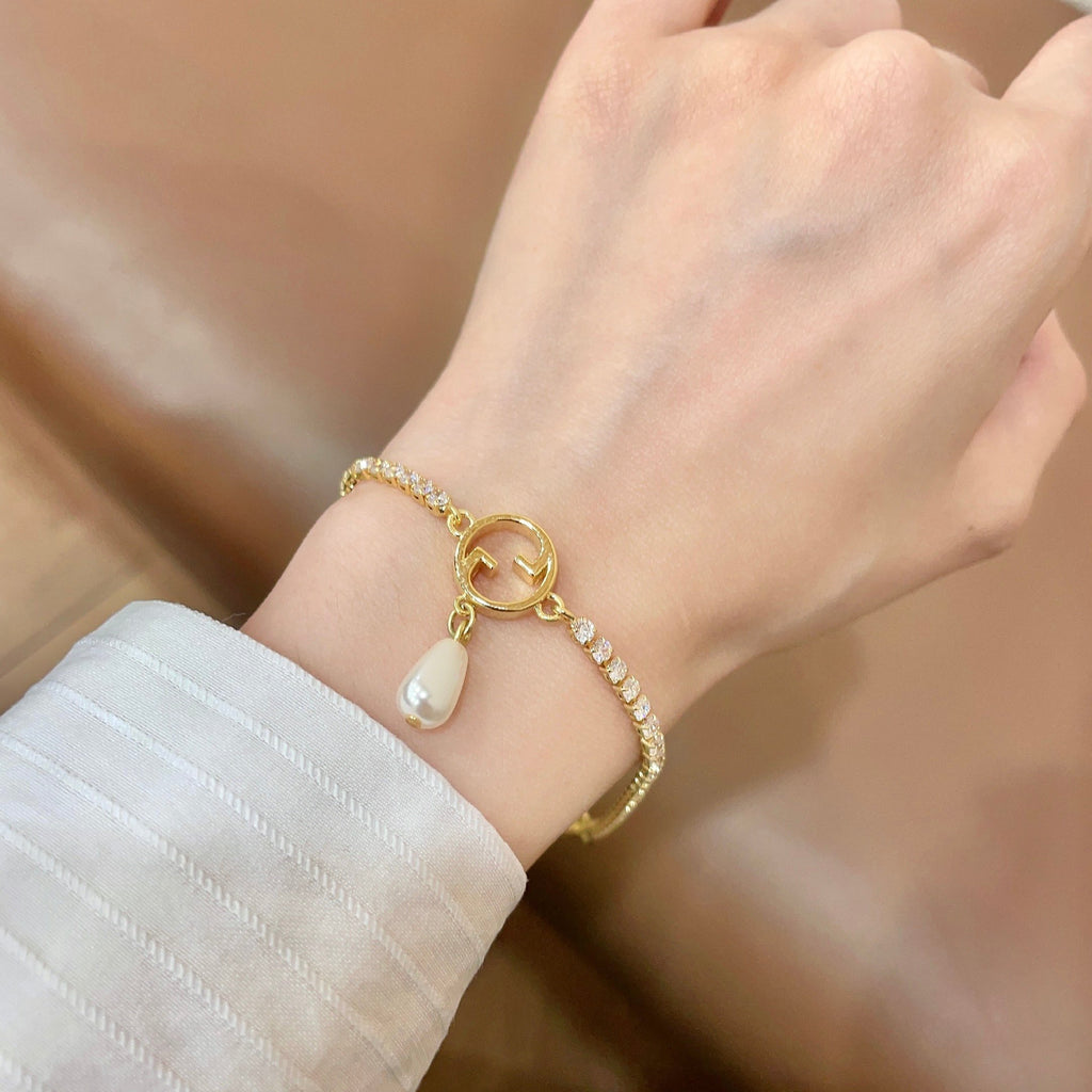 Gucci Gold-Tone G Charm Bracelet with Teardrop Accent - album image 2