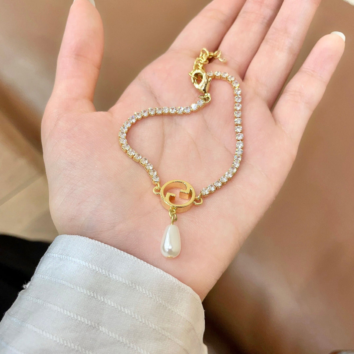 Gucci Gold-Tone G Charm Bracelet with Teardrop Accent - album image 4