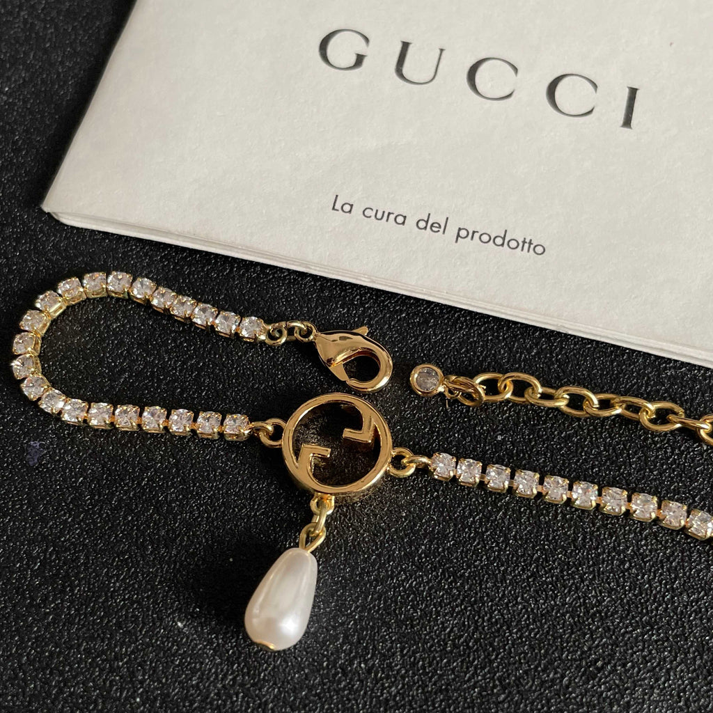 Gucci Gold-Tone G Charm Bracelet with Teardrop Accent - album image 6