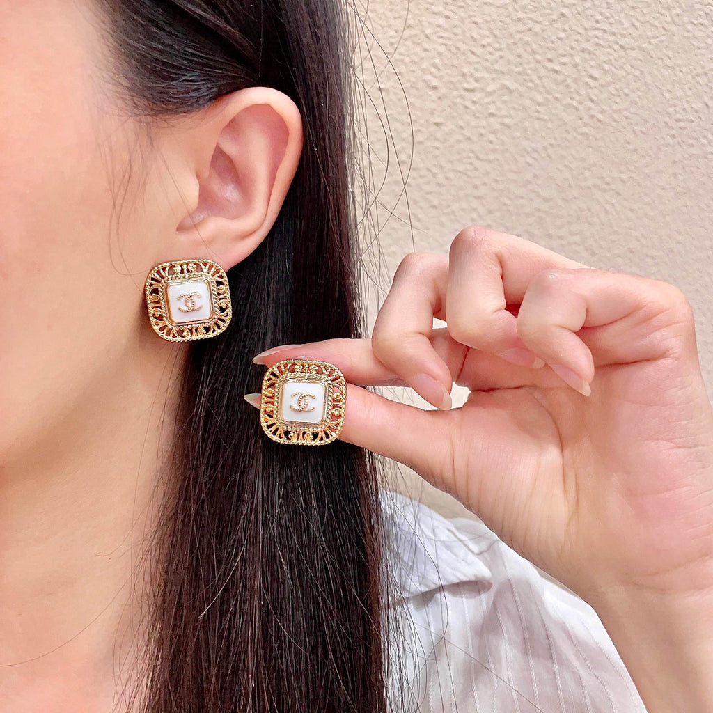 Chanel Interlocking C Stud Earrings - album image 1