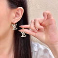 Louis Vuitton Silver-Tone LV Drop Earrings - album image 1