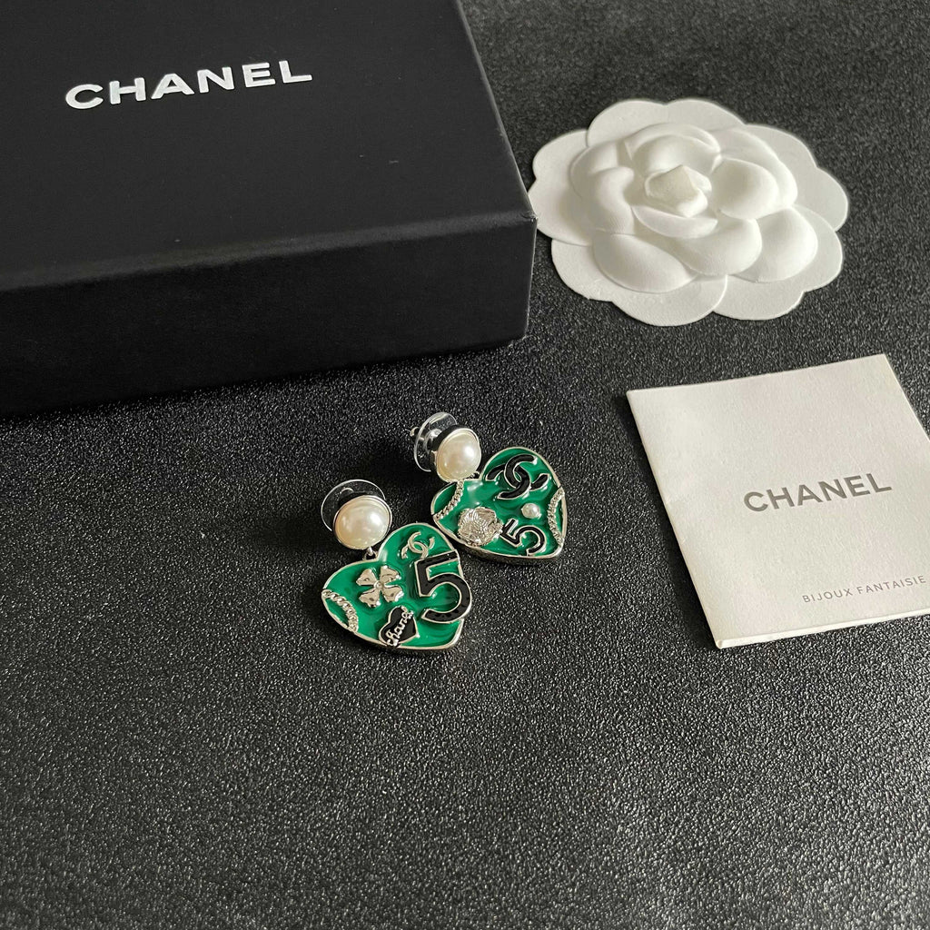 Chanel Interlocking C Pearl Asymmetric Earrings - album image 6