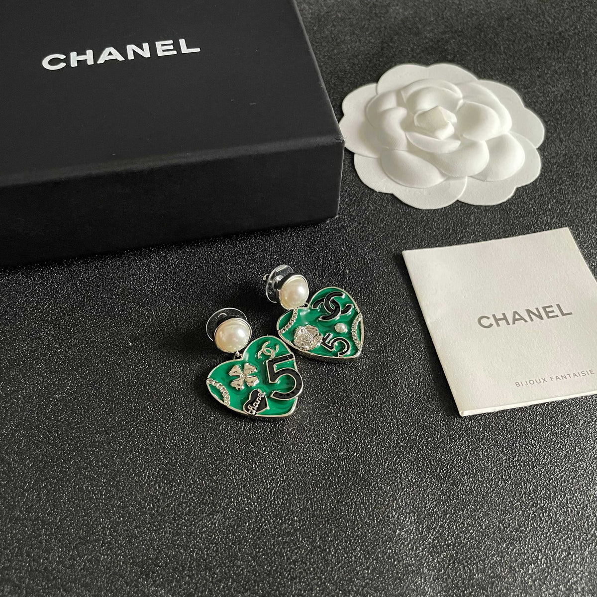 Chanel Interlocking C Pearl Asymmetric Earrings - album image 6