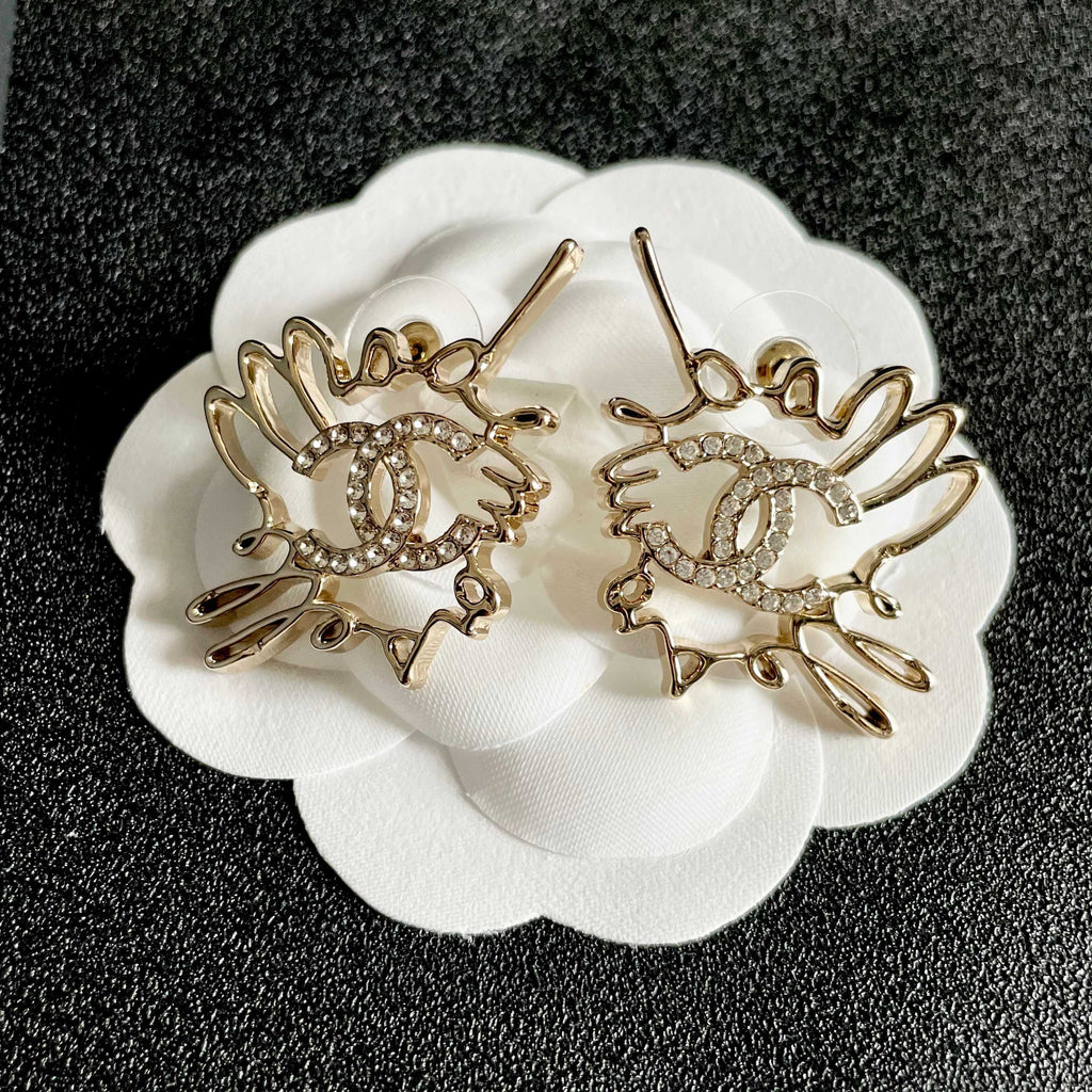 Chanel Interlocking C Crystal Accent Stud Earrings - album image 8