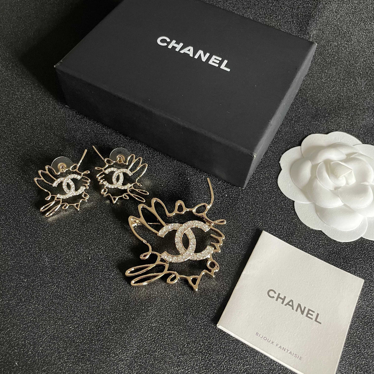 Chanel Interlocking C Crystal Accent Stud Earrings - album image 10