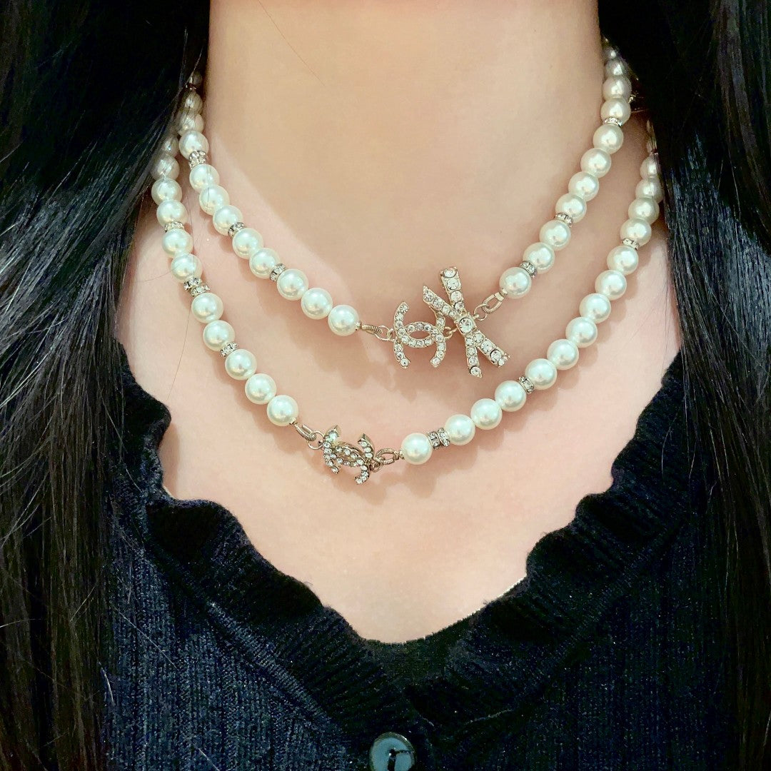 Chanel Pearl Letter Chain Necklace - album image 1