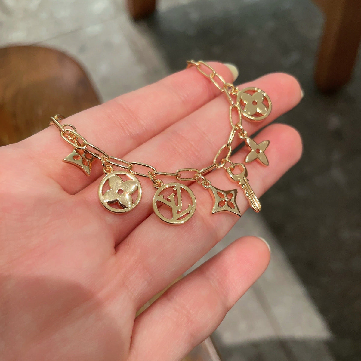 Louis Vuitton Gold-Tone LV and Flower Charm Bracelet - album image 4