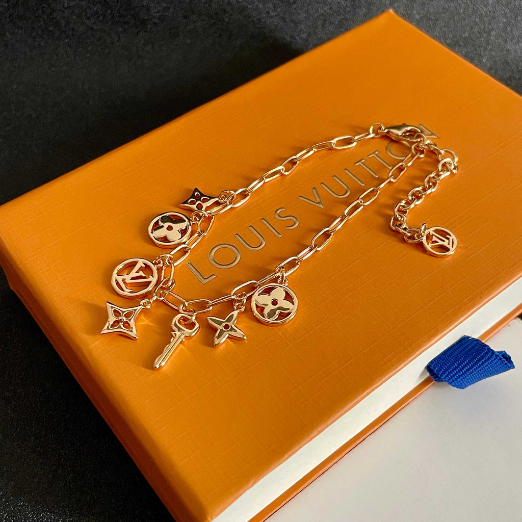 Louis Vuitton Gold-Tone LV and Flower Charm Bracelet - album image 7