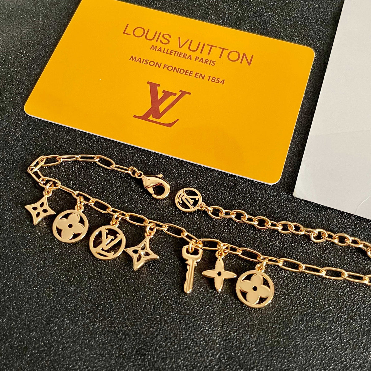 Louis Vuitton Gold-Tone LV and Flower Charm Bracelet - album image 9