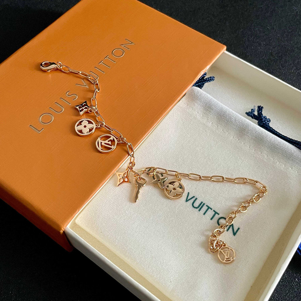 Louis Vuitton Gold-Tone LV and Flower Charm Bracelet - album image 8