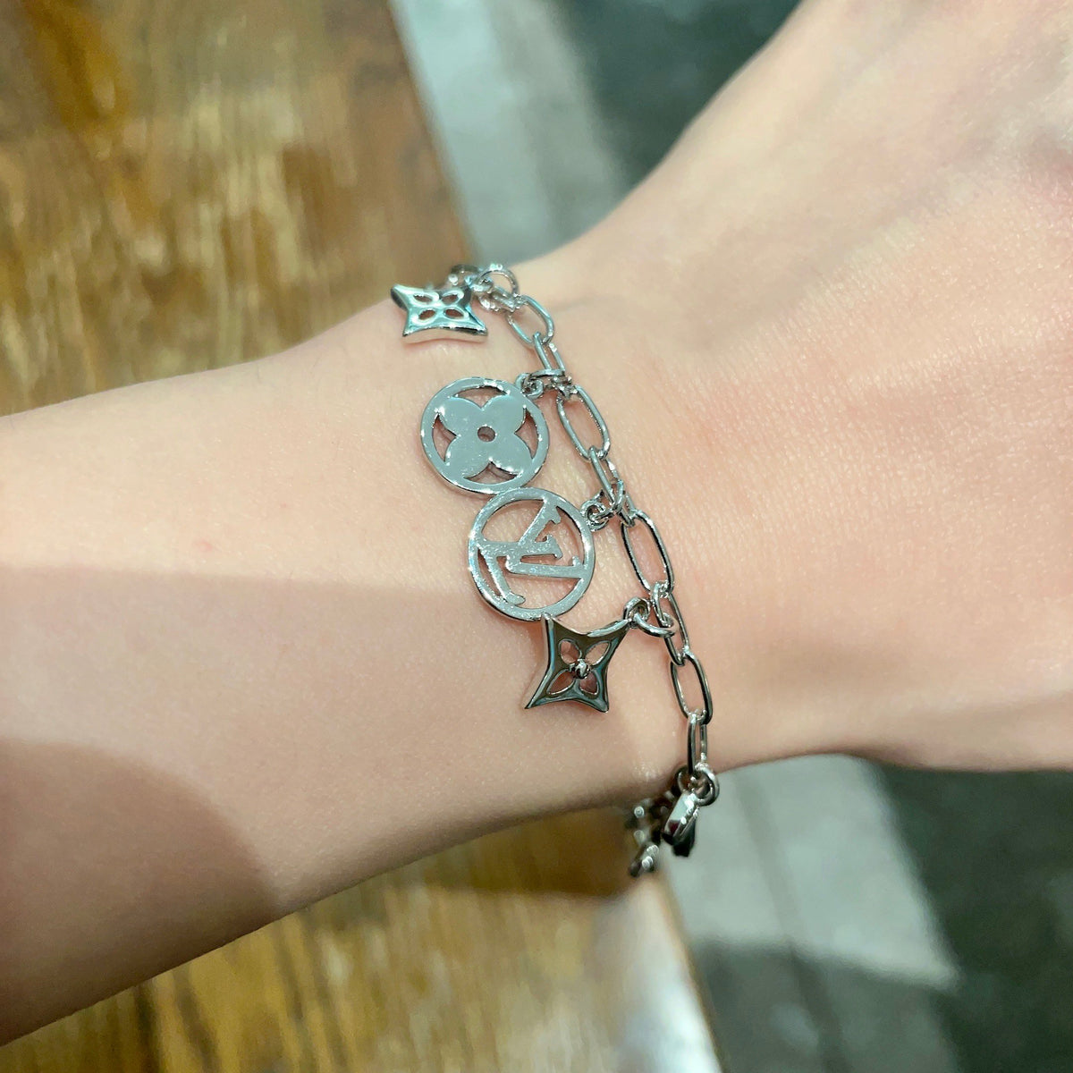 Louis Vuitton Silver-Tone LV and Flower Charm Bracelet - album image 1