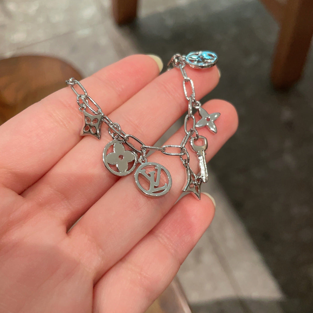 Louis Vuitton Silver-Tone LV and Flower Charm Bracelet - album image 3