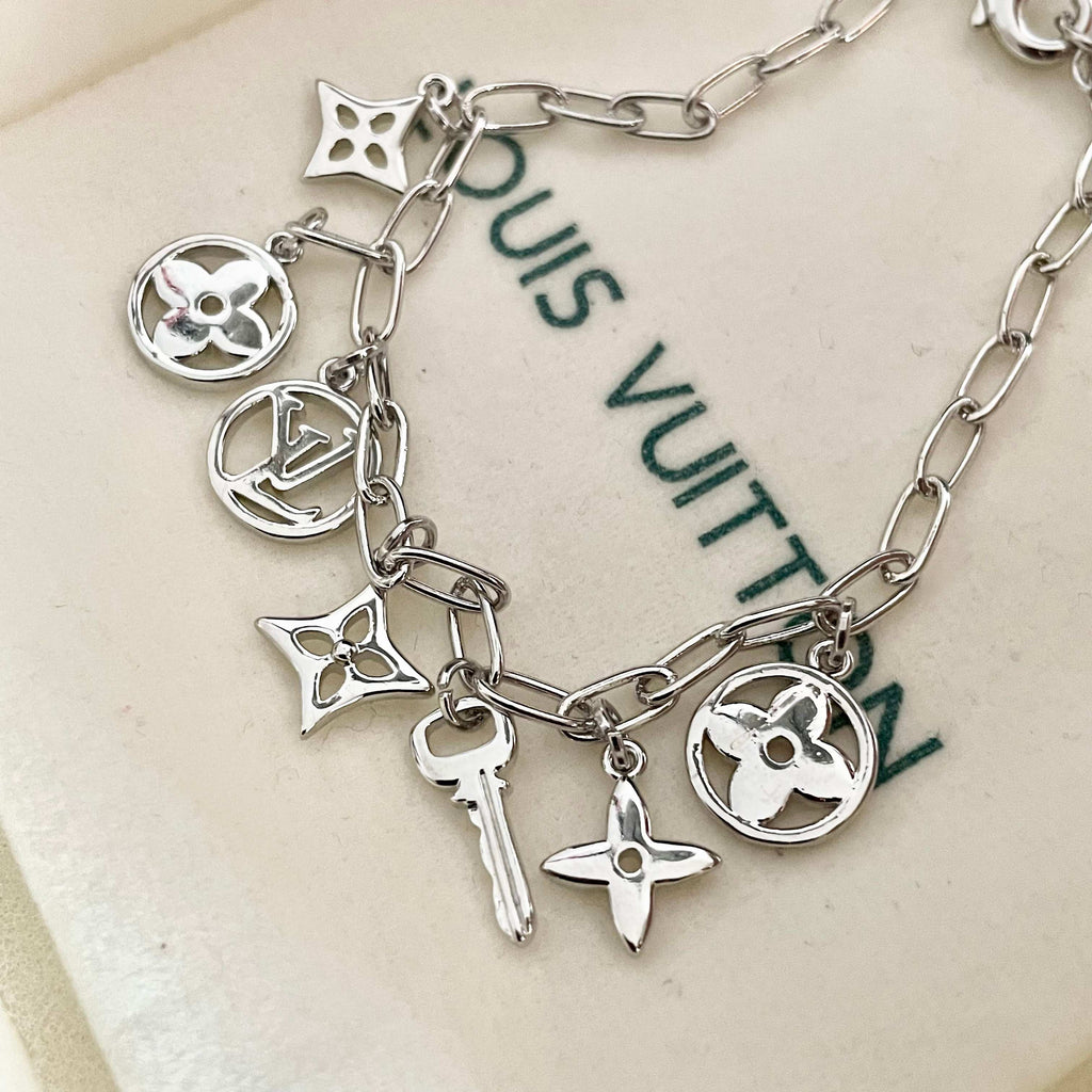 Louis Vuitton Silver-Tone LV and Flower Charm Bracelet - album image 8