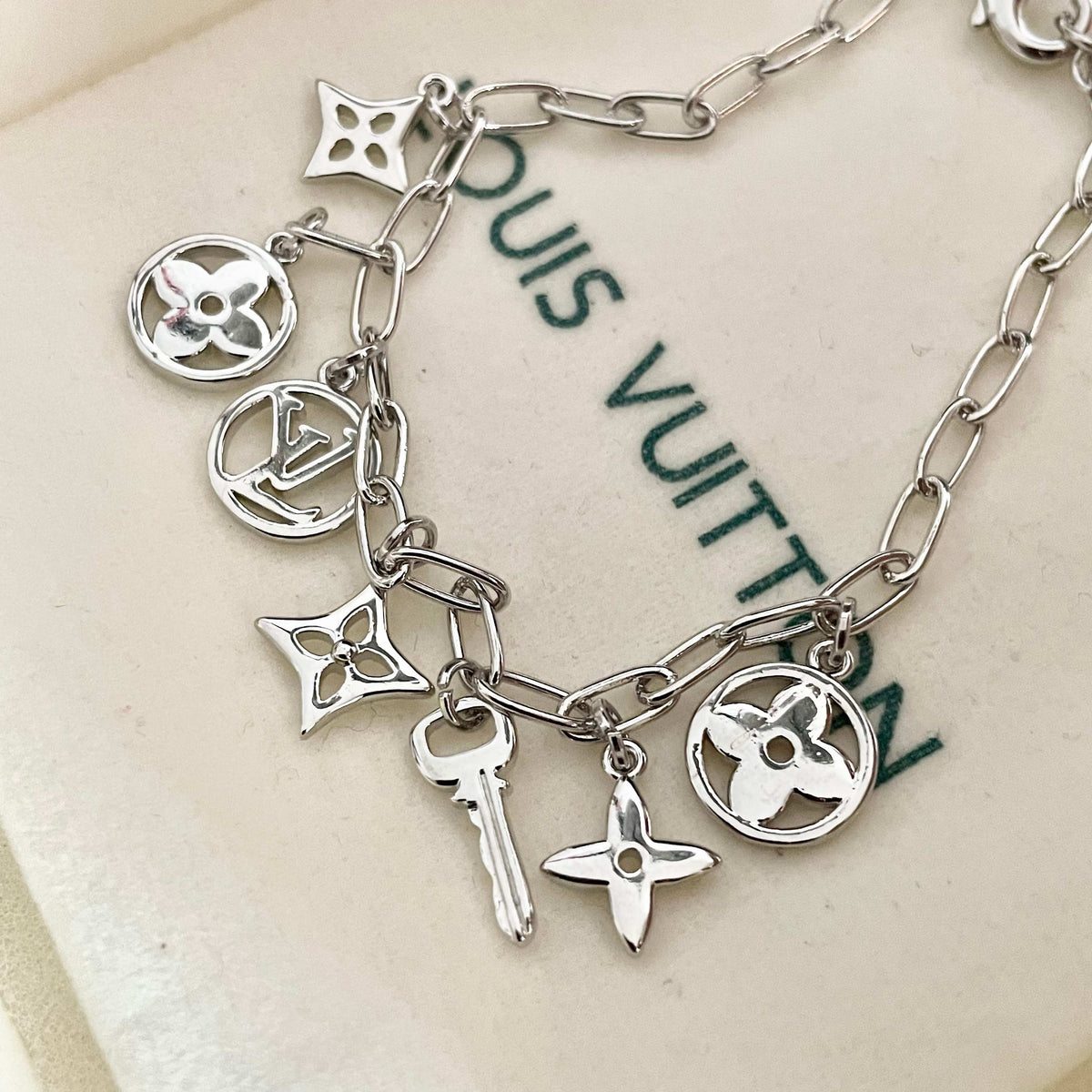 Louis Vuitton Silver-Tone LV and Flower Charm Bracelet - album image 8