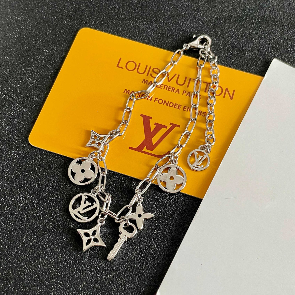 Louis Vuitton Silver-Tone LV and Flower Charm Bracelet - album image 9