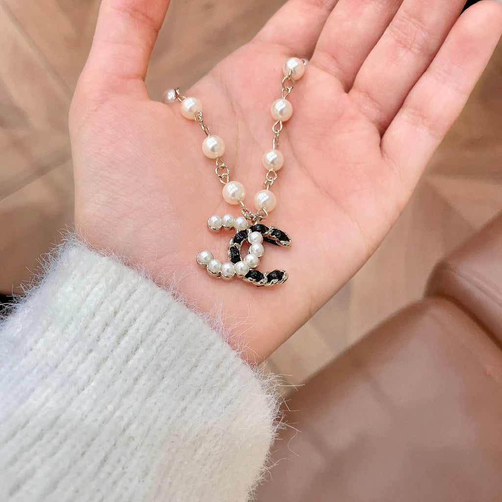 Chanel Pearl CC Pendant Necklace - album image 4