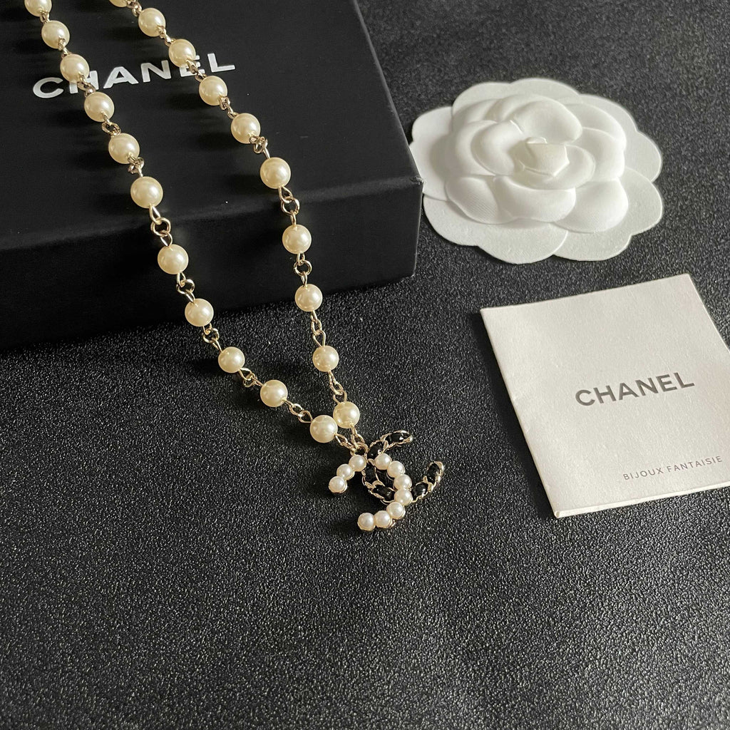 Chanel Pearl CC Pendant Necklace - album image 6