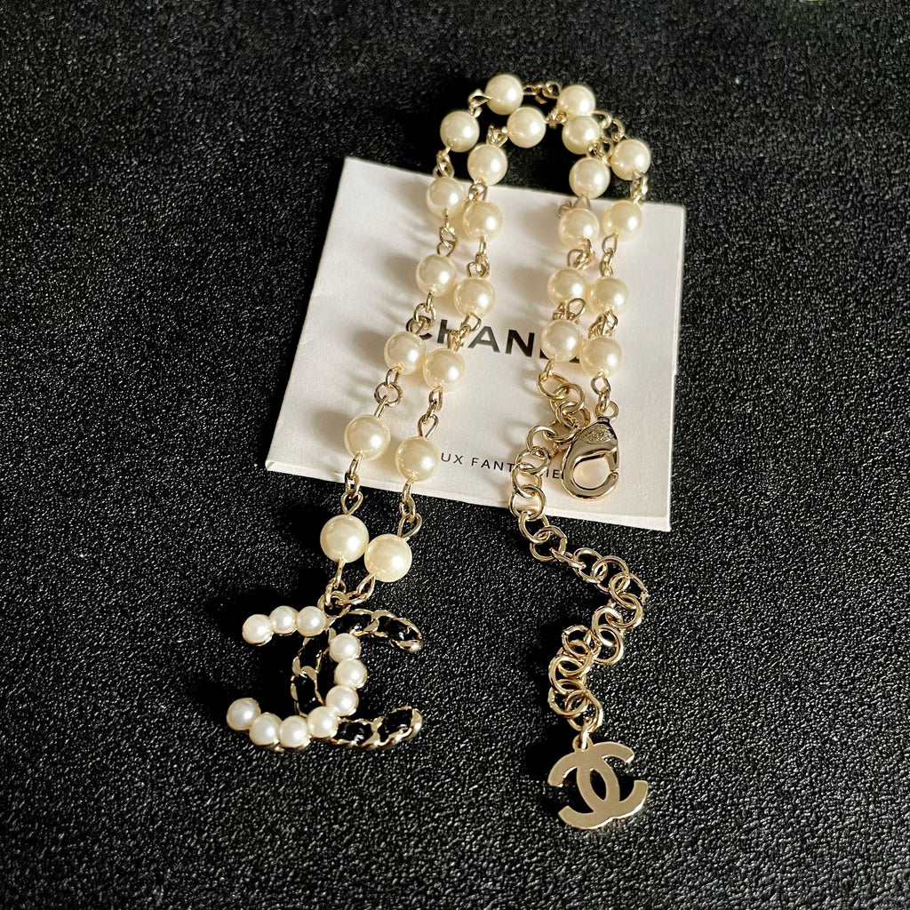 Chanel Pearl CC Pendant Necklace - album image 9