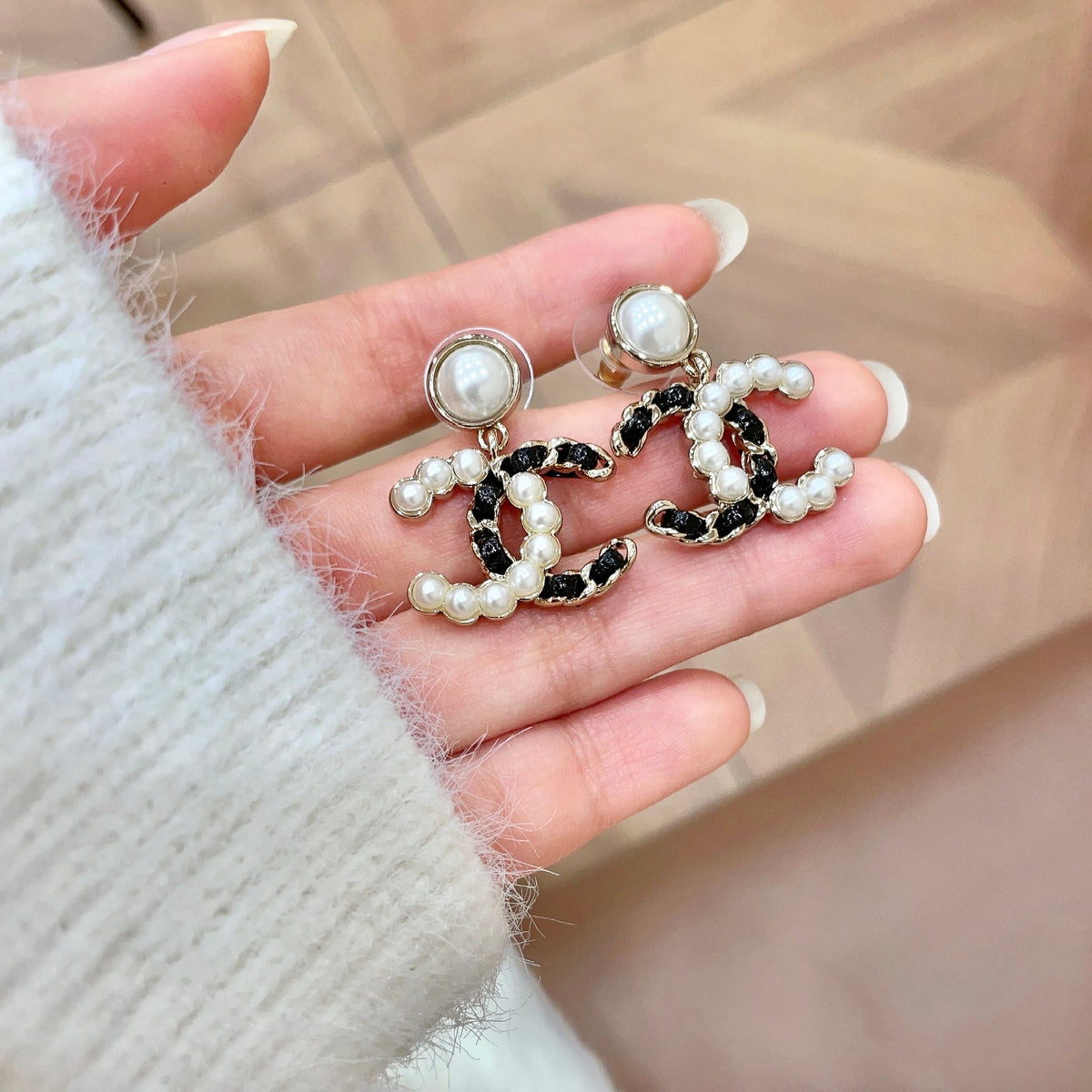 Chanel Interlocking C Stud Earrings - album image 4