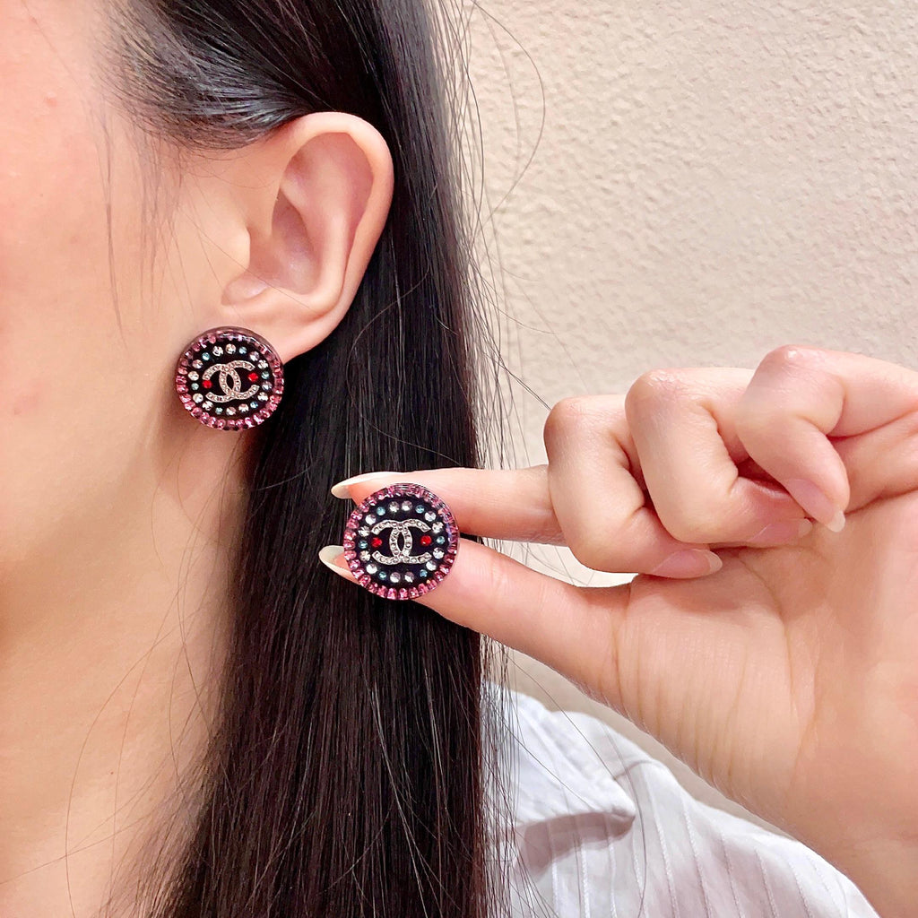 Chanel Interlocking C Stud Earrings - album image 1
