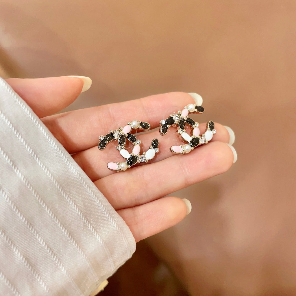 Chanel Interlocking C Stud Earrings - album image 4