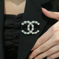 Chanel Silver-Tone Pearl CC Brooch - album image 1