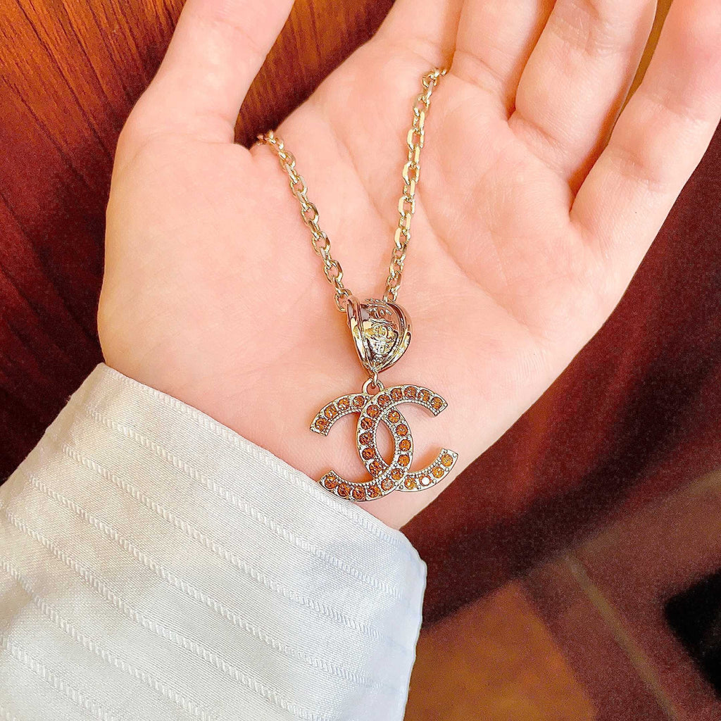 Chanel Interlocking C Crystal Accent Necklace - album image 4