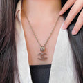 Chanel Interlocking C Crystal Accent Necklace - album image 1
