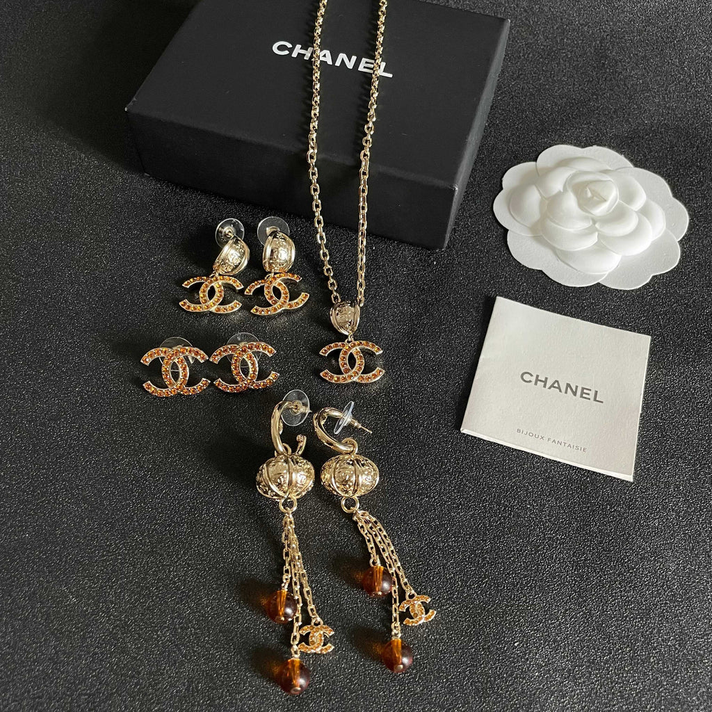 Chanel Interlocking C Crystal Accent Stud Earrings - album image 11