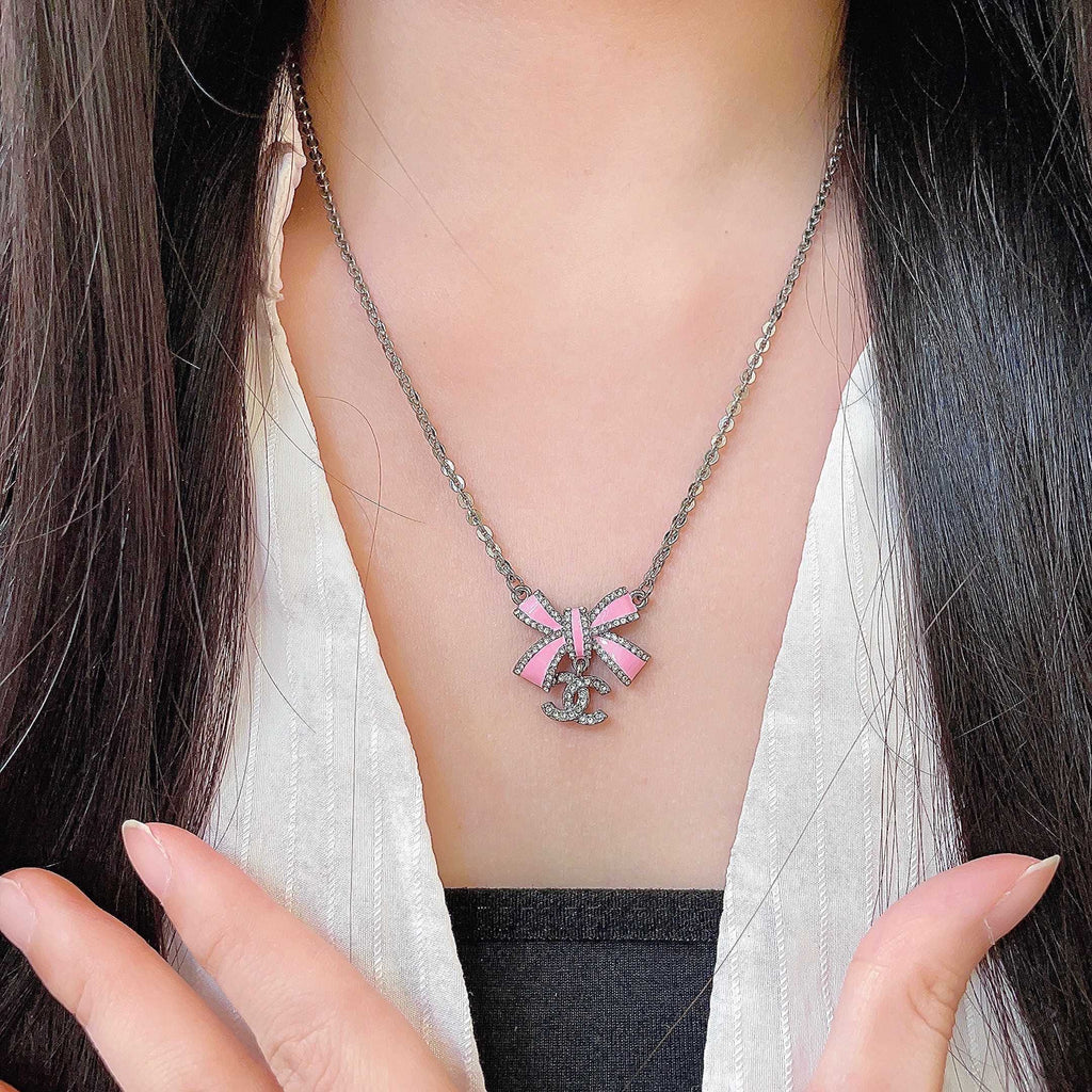 Chanel Interlocking C Bow Butterfly Crystal Accent Necklace - album image 2