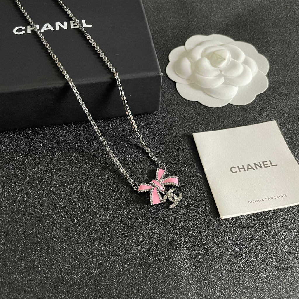 Chanel Interlocking C Bow Butterfly Crystal Accent Necklace - album image 6