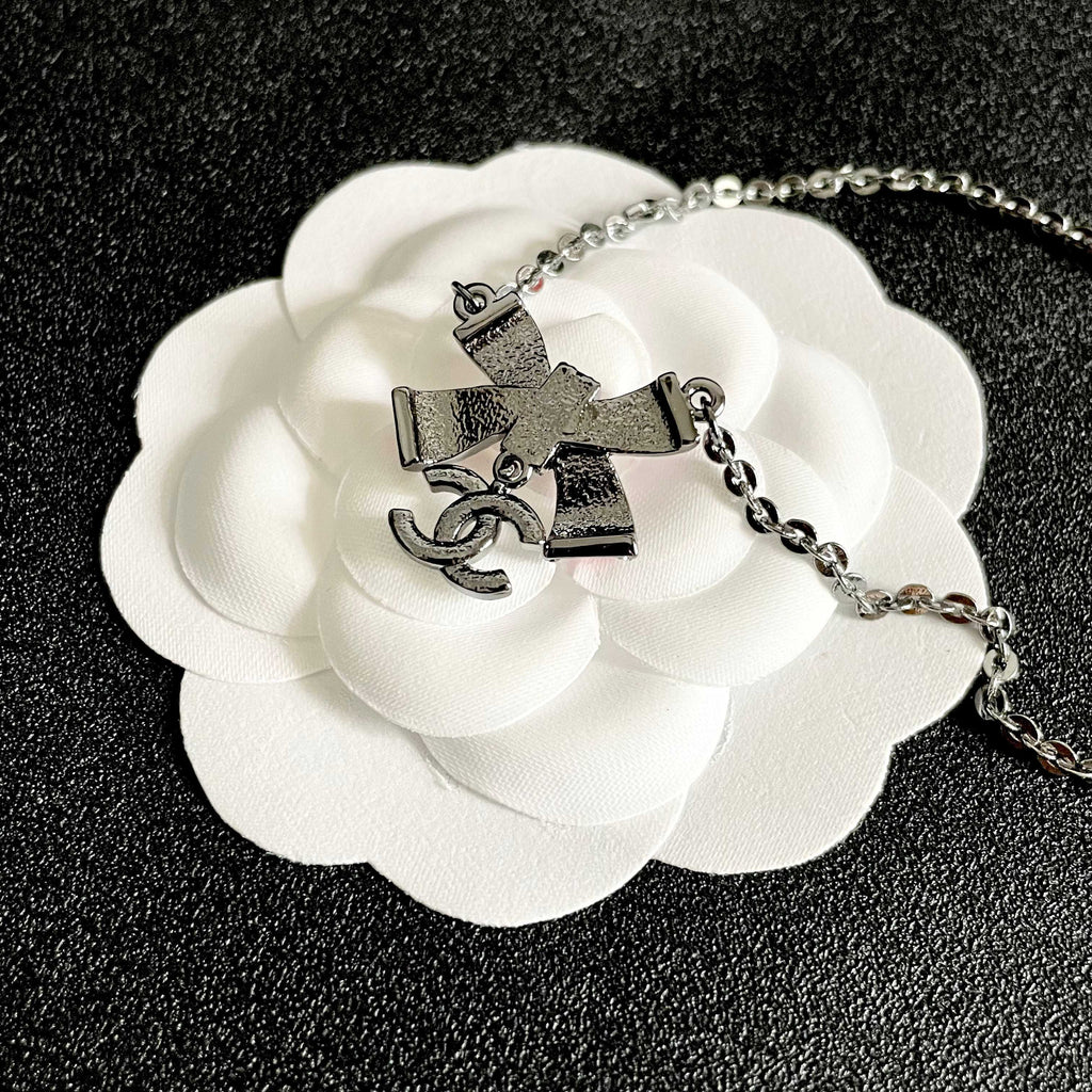 Chanel Interlocking C Bow Butterfly Crystal Accent Necklace - album image 8