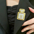 Chanel Interlocking C Perfume Bottle Pearl Brooch - album image 1