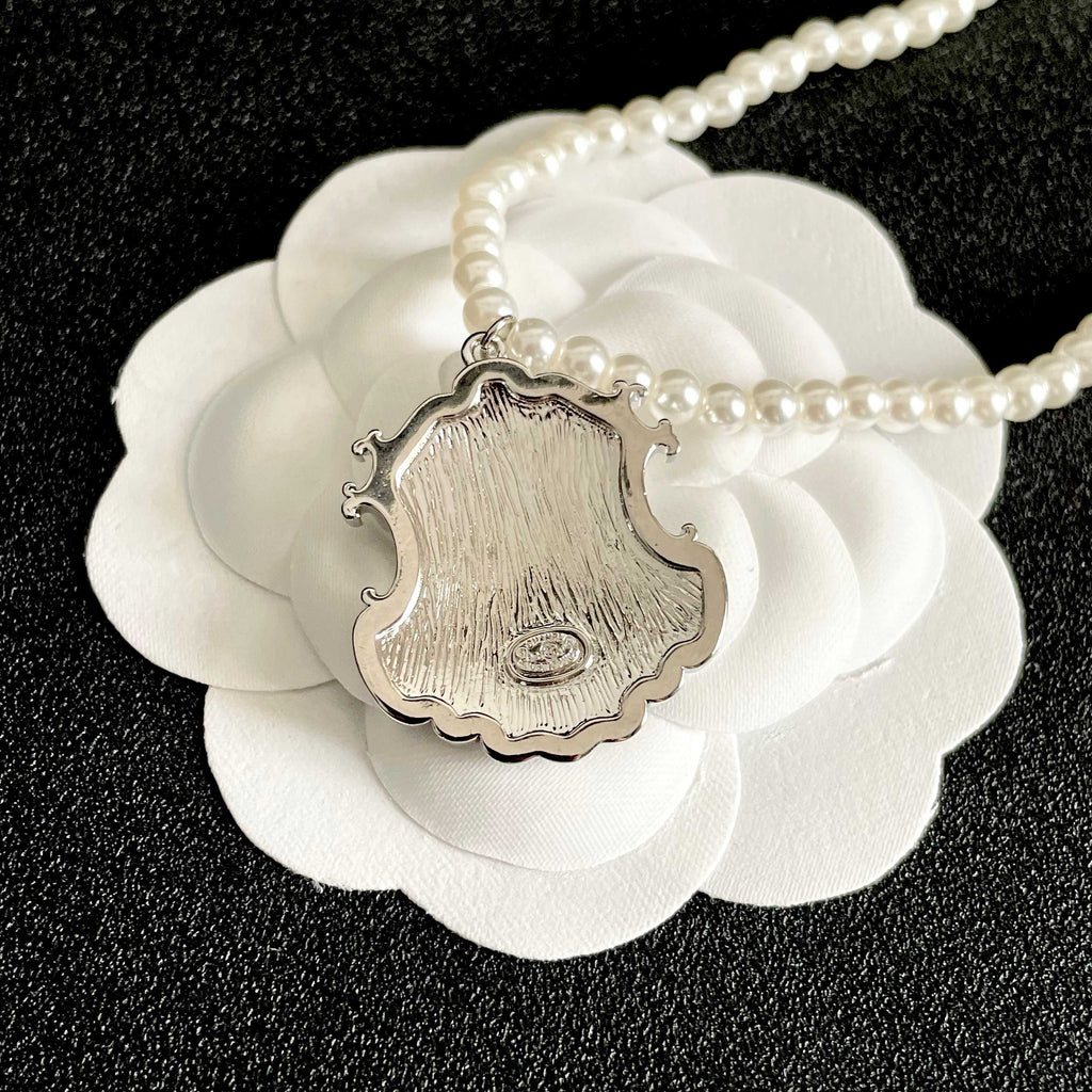 Chanel Interlocking C Pearl Letter Necklace - album image 8