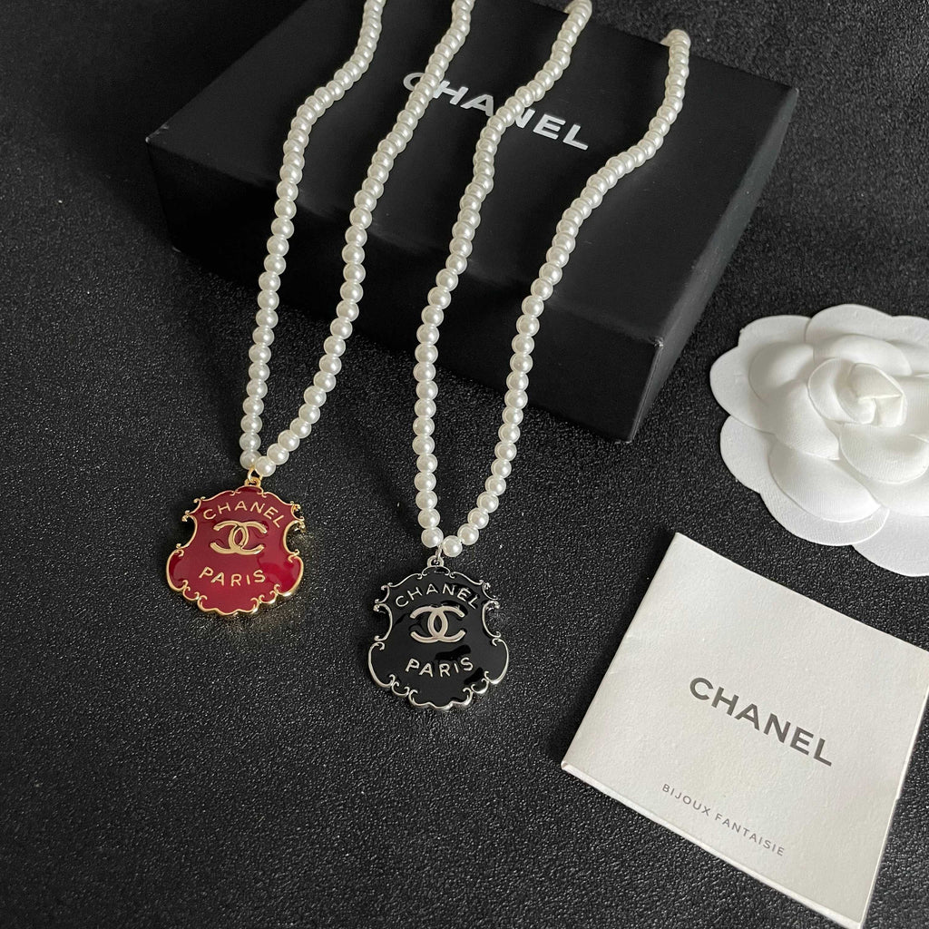 Chanel Interlocking C Pearl Letter Necklace - album image 5