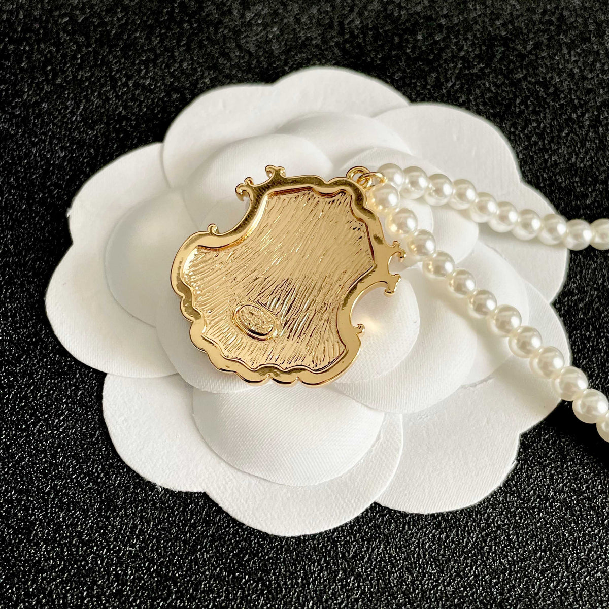 Chanel Interlocking C Pearl Letter Necklace - album image 8