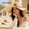 Celine Celine Woven Open Knit Hat worn by a Western model with product detail inset