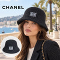 Chanel Bucket Hat worn by a model