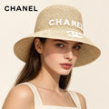 Model wearing chanel bucket hat on head