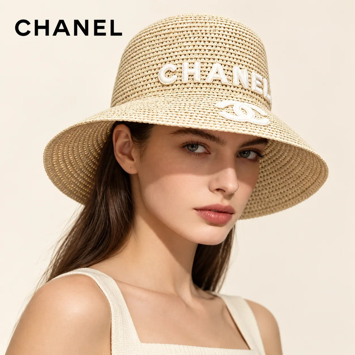 Model wearing chanel bucket hat on head