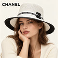 Model wearing chanel hat on head