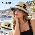 Chanel Straw Hat worn by a model