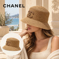Chanel Chanel Woven Open Knit Bucket Hat worn by a Western model with product detail inset