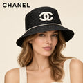 Model wearing chanel woven open knit hat on head