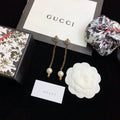 Gucci Gold-Tone Pearl Drop Earrings - album image 1